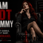 Article banner for “I Am NOT Mommy” featuring Goddess Sofia, an auburn-haired woman seated confidently in a black leather chair, dressed in black with red lipstick and crossed legs. Large red and white typography reads “I AM NOT MOMMY,” with “I DON’T CUDDLE. I DON’T BABY. I COMMAND.” beneath it, while a framed “RESPECT OBEY SERVE” sign, crown, books, and chess pieces reinforce the commanding atmosphere. WorshipSofia.com appears at the bottom.
