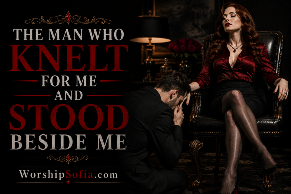 The Man Who Knelt for Me and Stood Beside Me page banner featuring Goddess Sofia seated regally in a black leather chair while a man kneels beside her, set in an elegant dark study with crimson roses, warm lamplight, and gold accents. The title and WorshipSofia.com appear on the banner.
