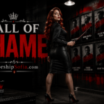 Wall of Shame page banner featuring Goddess Sofia in a sleek black outfit and heels, standing before a display of framed submissive portraits marked Exposed, with dramatic red and black décor. The title Wall of Shame and WorshipSofia.com appear prominently.